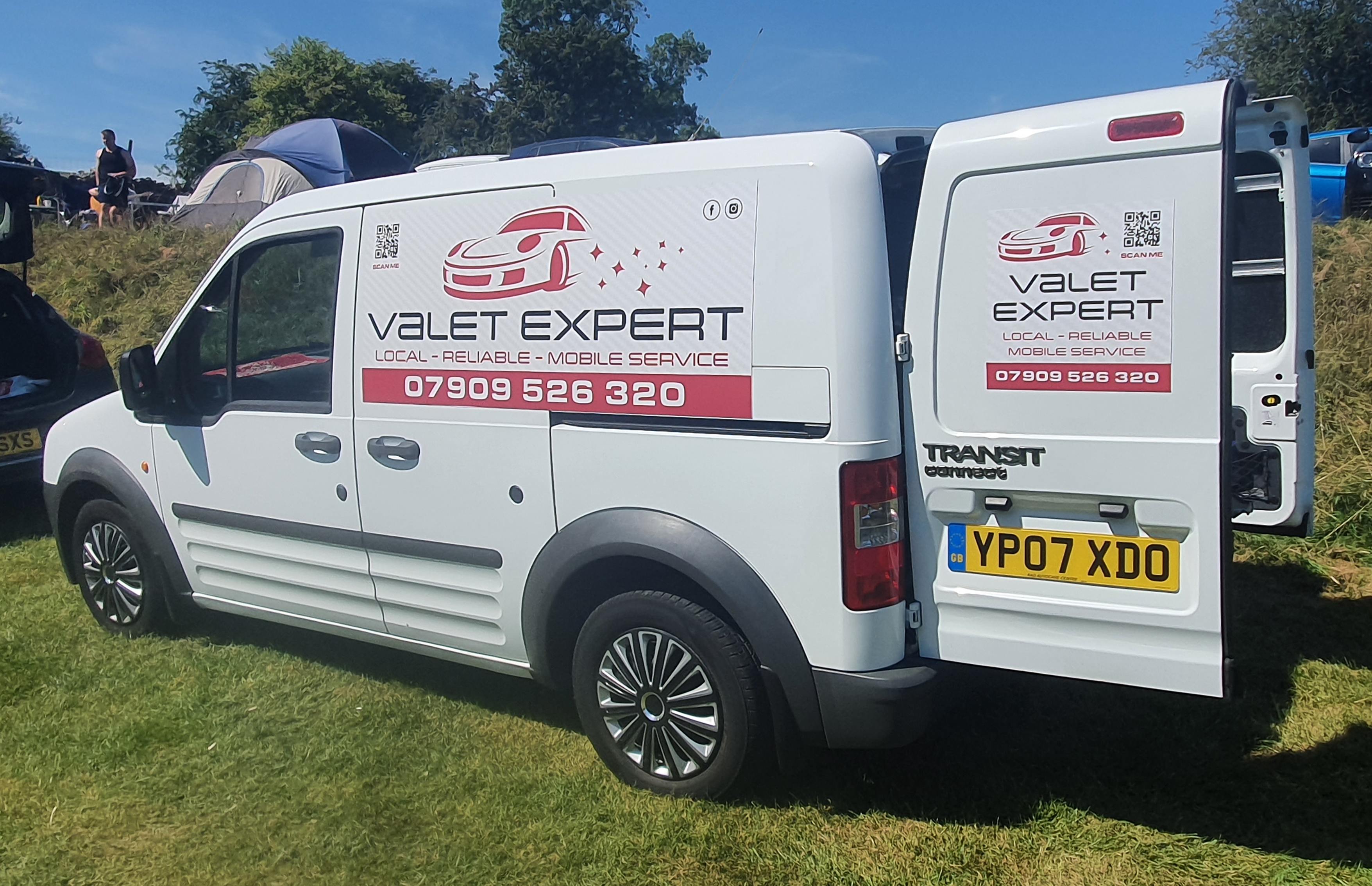 The valet expert van with signage